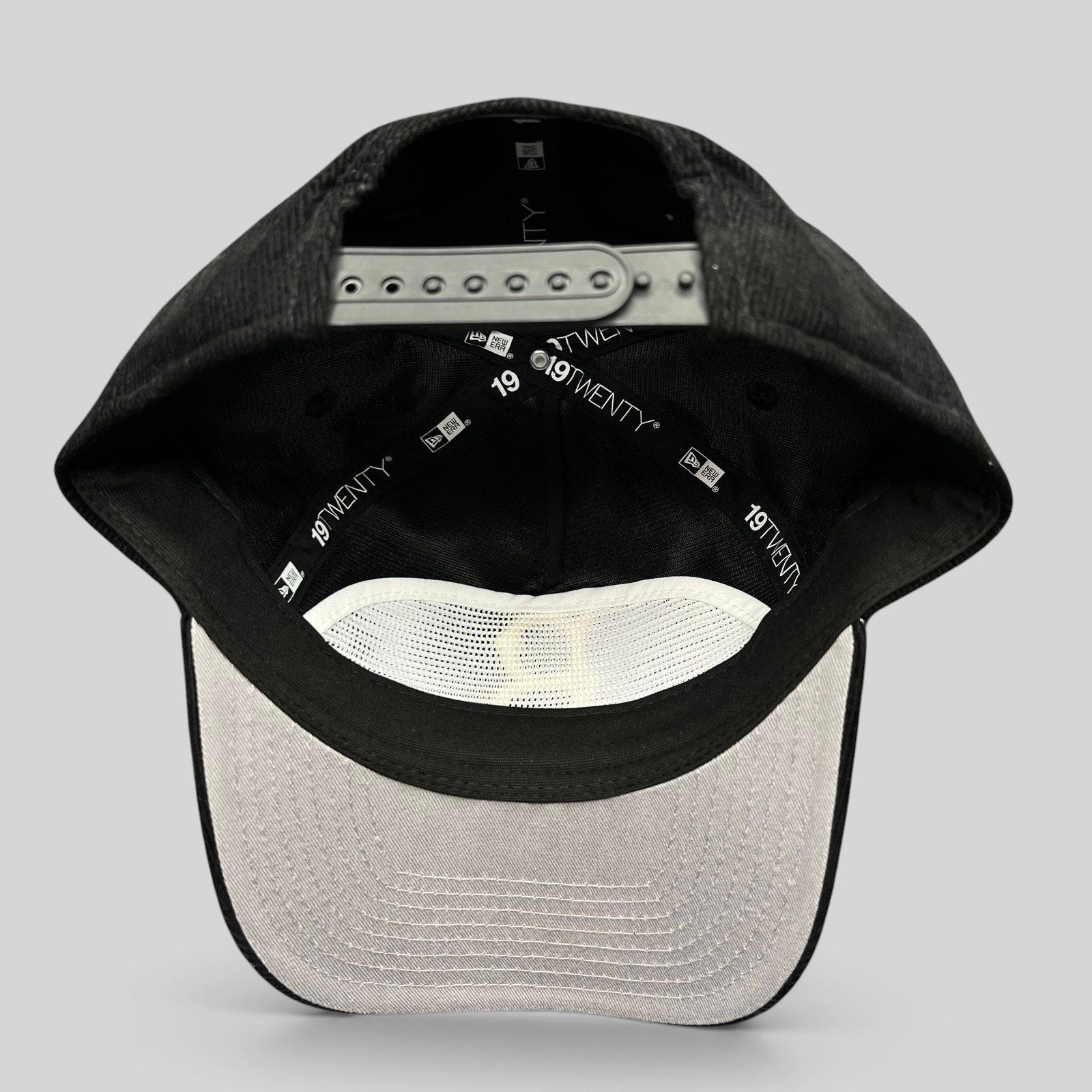 Raree Finds New Era 9TWENTY Brooklyn Dodgers black corduroy snapback hat showing the interior adjustable strap
