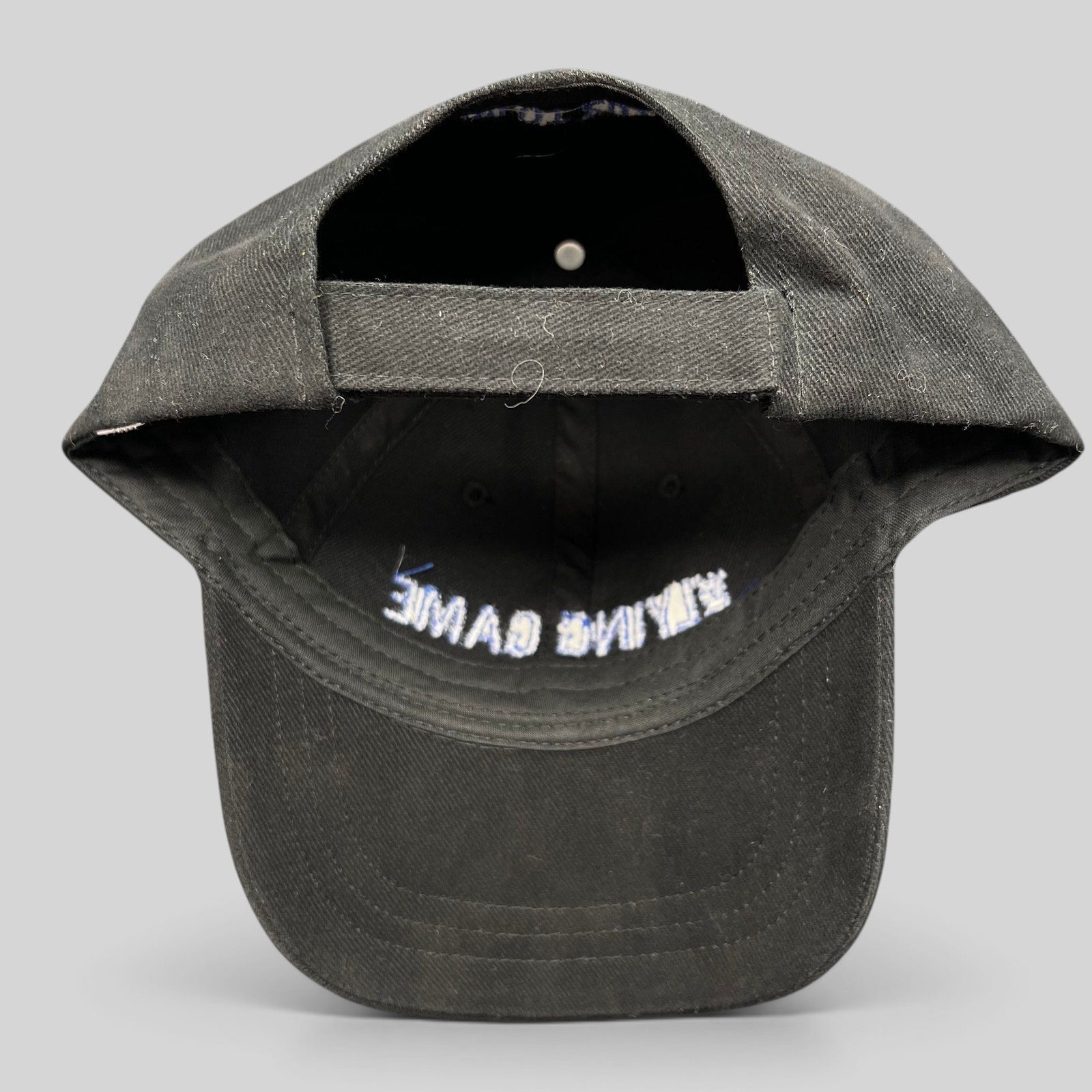 Raree Finds black cotton strapback crew hat from The Lying Game 2010 pilot with blue interior embroidery
