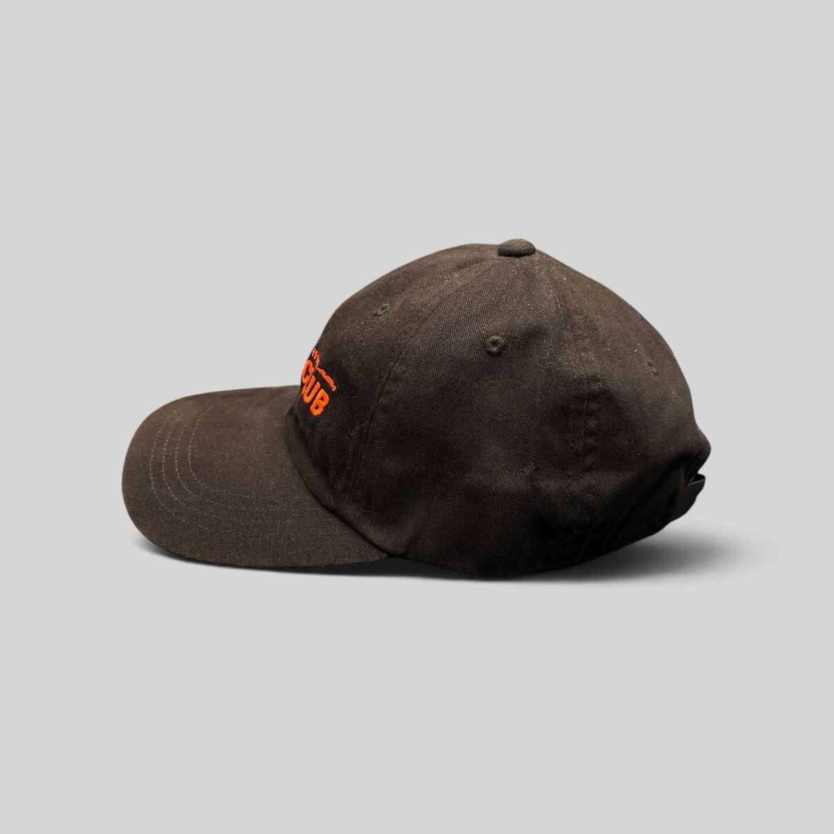 Raree Finds black cotton strapback hat with orange Mahanakhon Skate Club embroidery, side profile view.