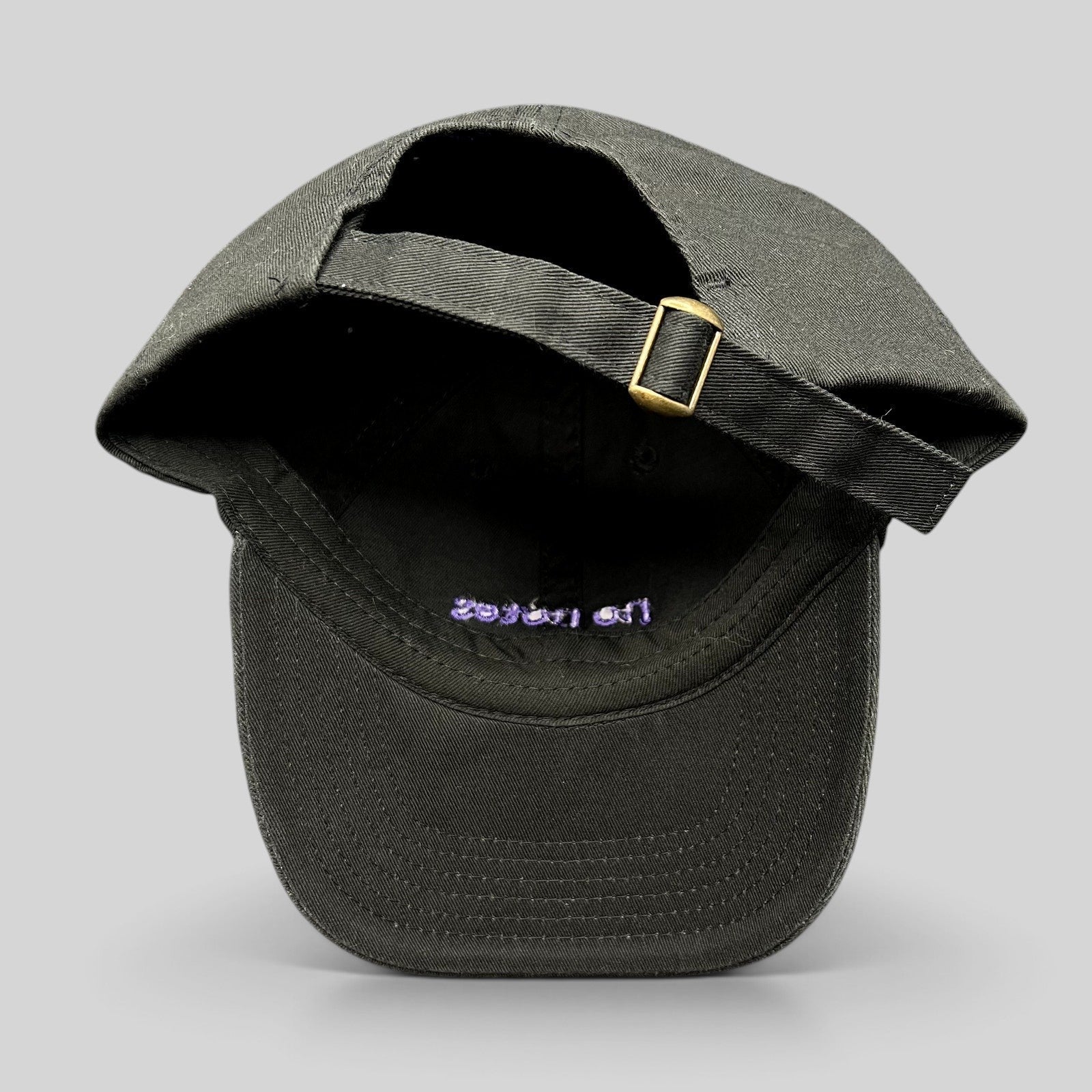 Raree Finds black cotton twill dad hat with adjustable brass buckle strapback and purple interior embroidery