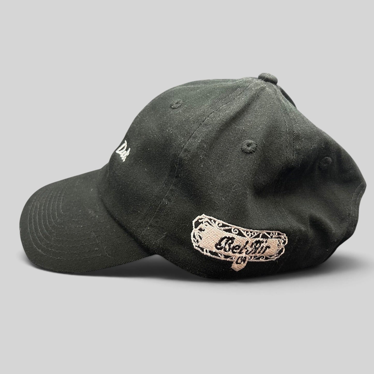 Raree Finds black cotton strapback hat by Farewell Headwear featuring white Beverly Glen Deli and Bel-Air embroidery