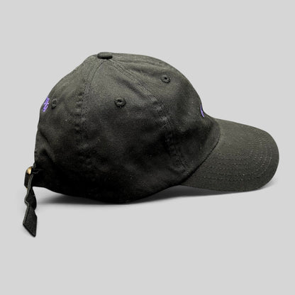 Raree Finds black cotton twill dad hat with purple embroidered No Notes text and adjustable brass buckle strapback