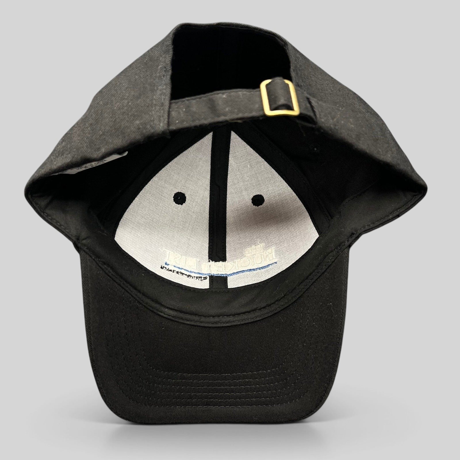 Raree Finds black cotton strapback hat from The Bucket List film with white and blue interior embroidery