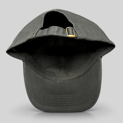 Raree Finds black cotton strapback hat from the John Wick Ballerina stunt department with adjustable brass buckle