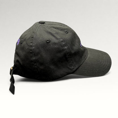 Raree Finds black cotton twill dad hat with purple embroidered No Notes text and adjustable brass buckle strapback