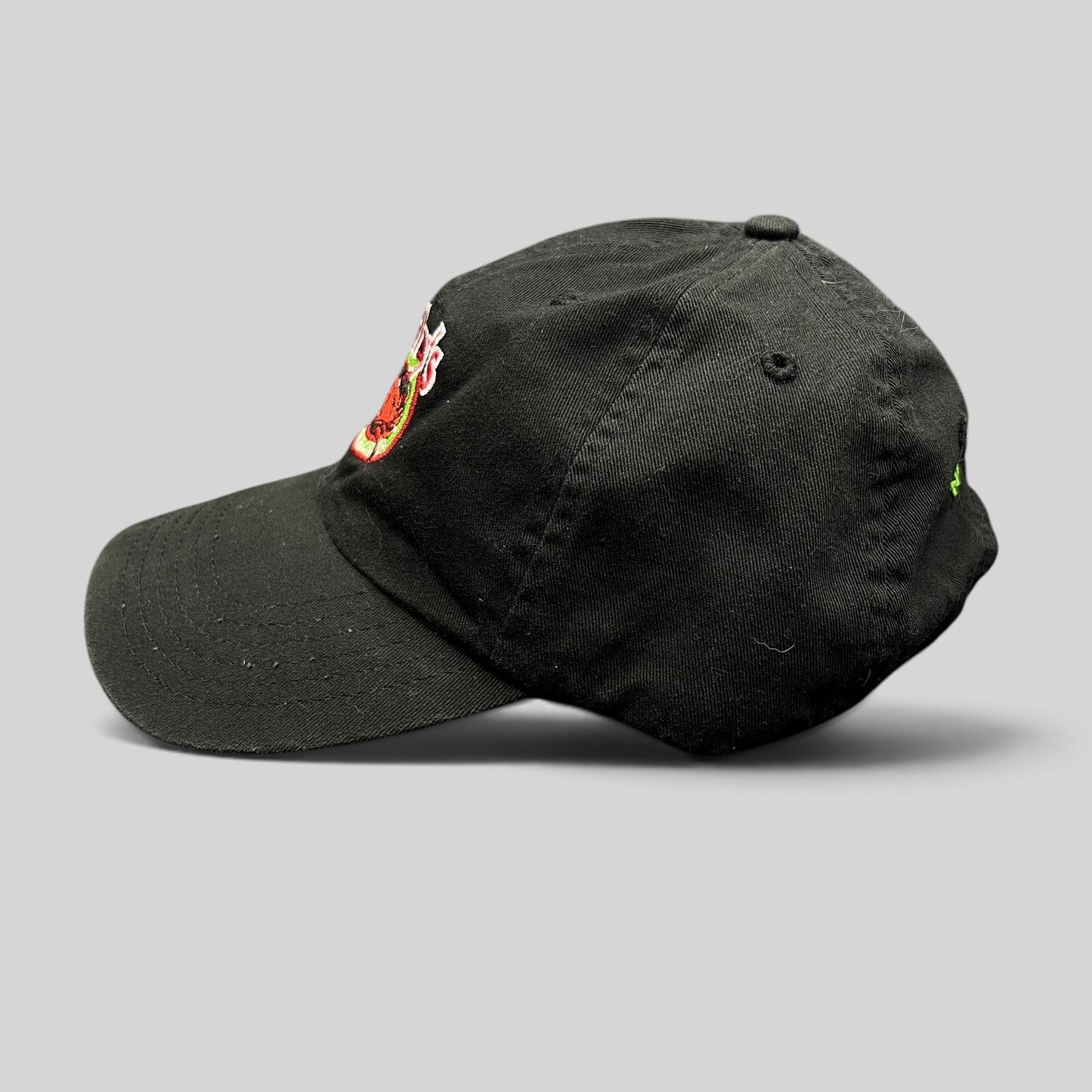 Raree Finds black cotton strapback hat with Kelly’s Restaurant crab logo embroidery and curved brim side view