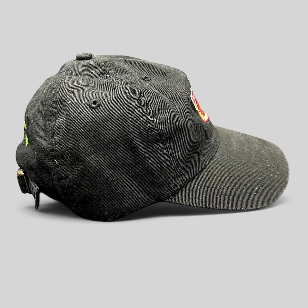 Raree Finds black cotton strapback hat with Kelly’s Restaurant crab logo embroidery and side profile view