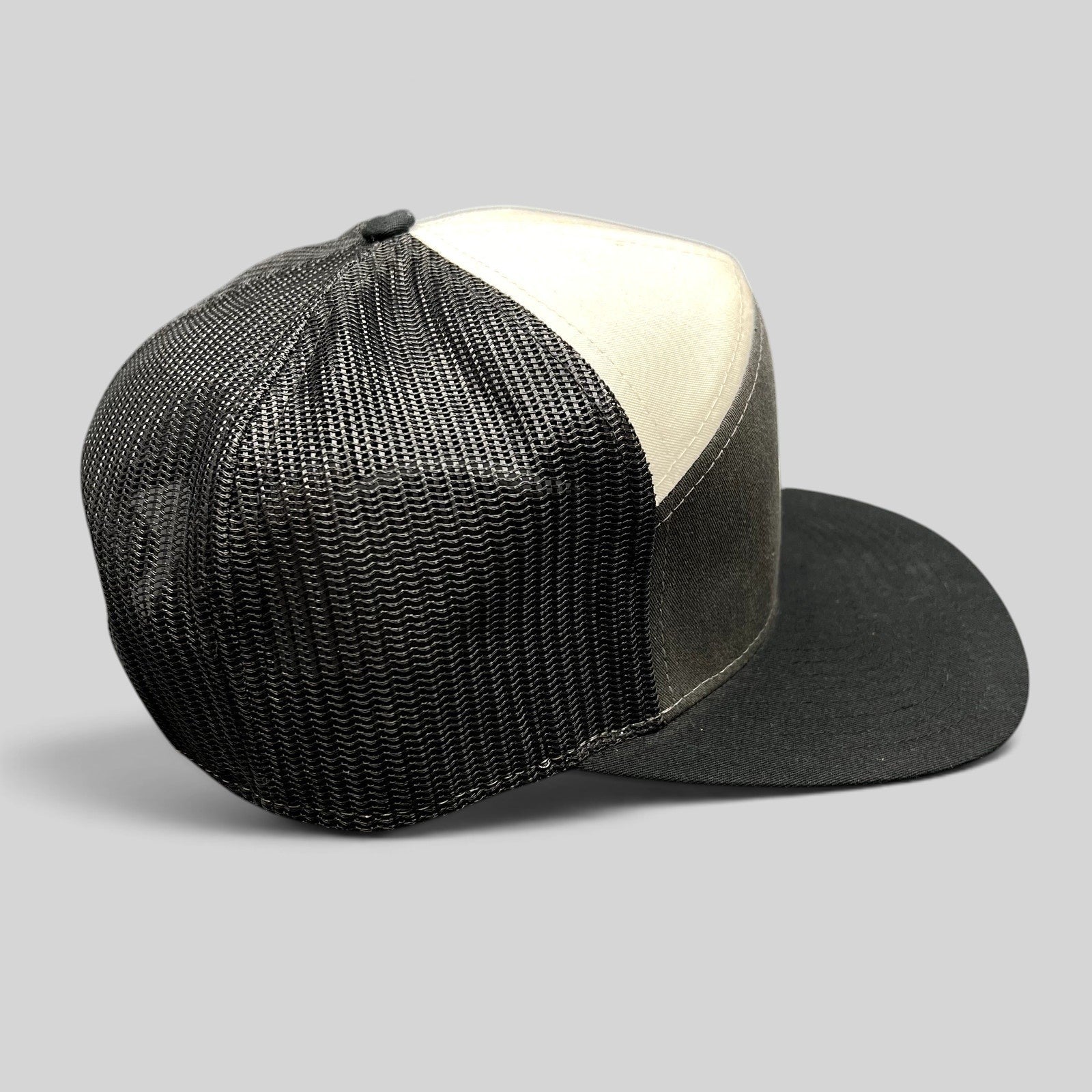 Raree Finds Mother Earth Brew Co Richardson trucker hat in black and cream with mesh back and snapback closure