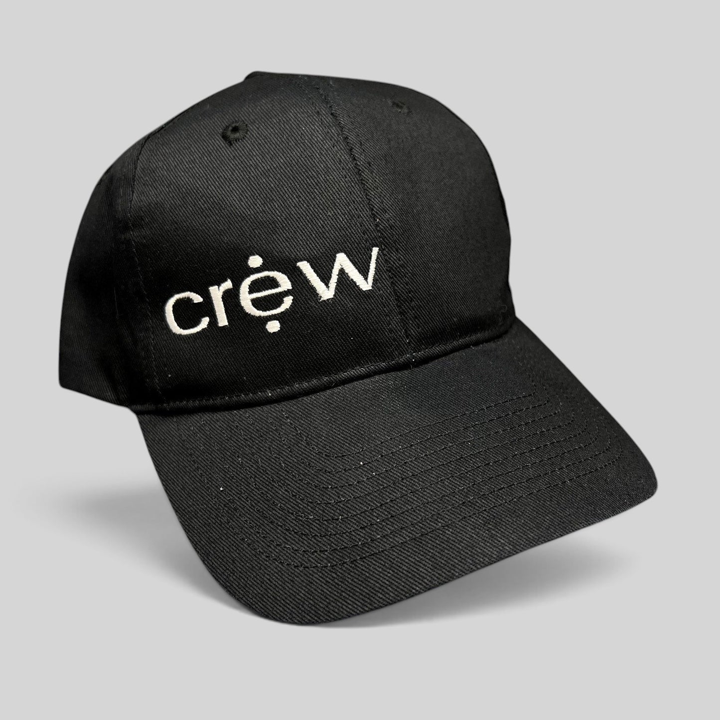 Raree Finds black KC Headwear snapback hat with white embroidered crew logo on a structured six-panel crown