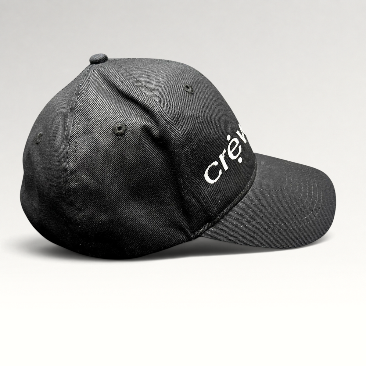 Raree Finds black KC Headwear snapback hat with white embroidered crew logo on a structured six-panel crown
