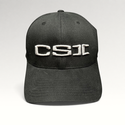 Raree Finds black Yupoong Flexfit cap with raised gray CSI embroidery on the front, production staff style.