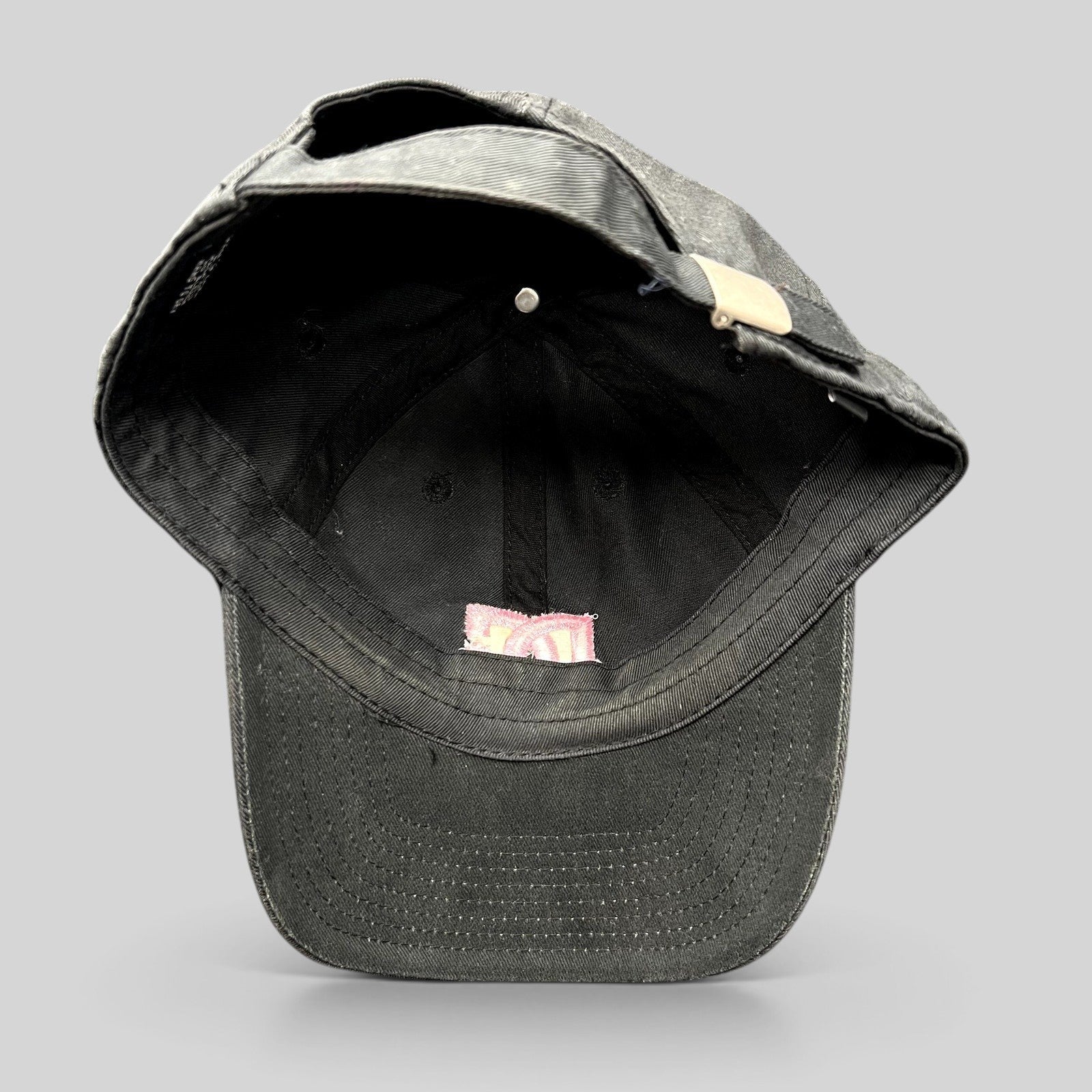 Raree Finds black cotton DC Shoes strapback hat with pink embroidered logo, interior view showing unstructured fit