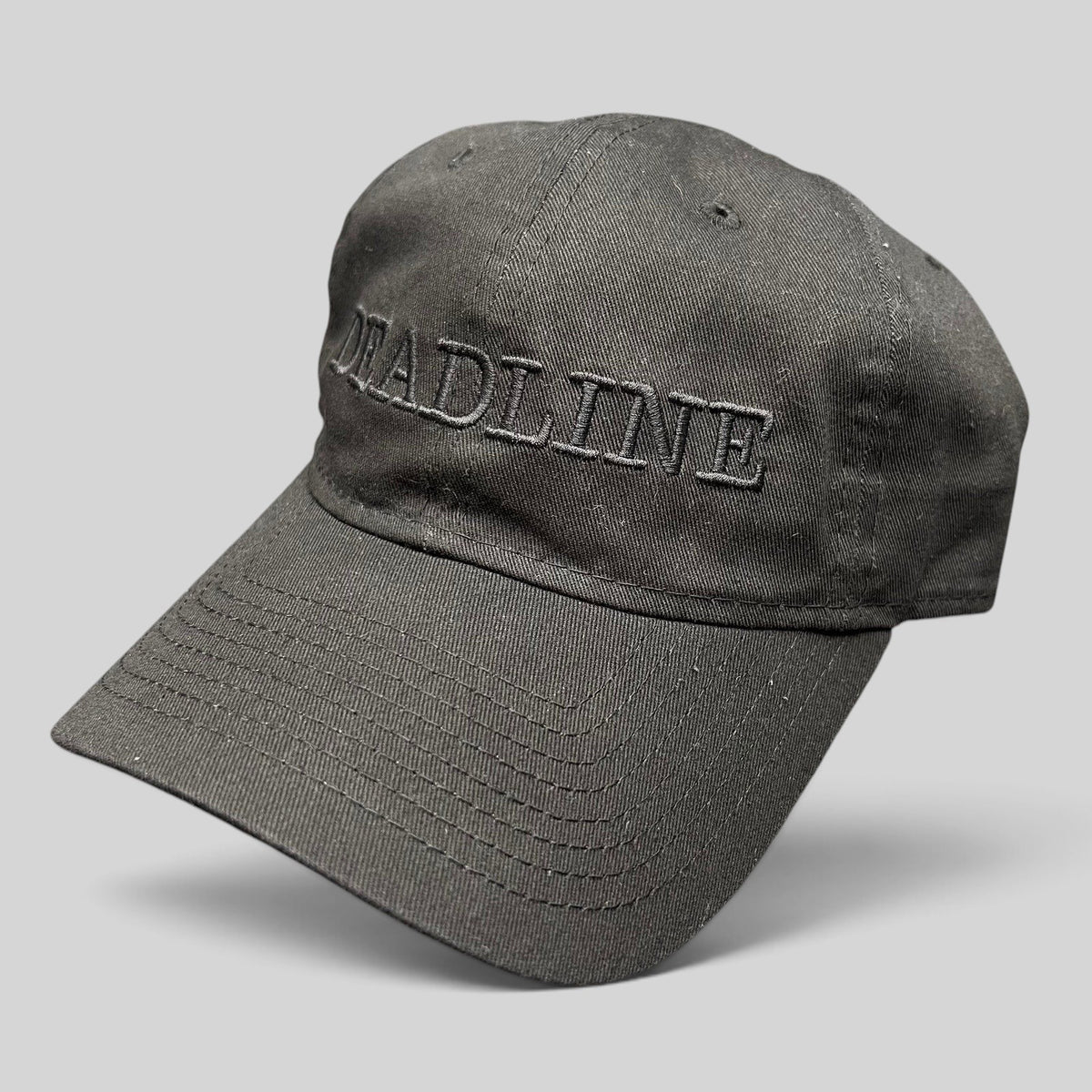 Raree Finds black New Era 9TWENTY strapback hat with tonal DEADLINE embroidery and curved bill