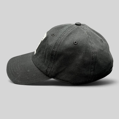 Raree Finds black cotton strapback hat with white Death Row Records logo embroidery and curved brim side view