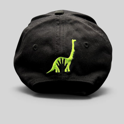 Raree Finds black strapback hat featuring green embroidered dinosaur character on the back from The Good Dinosaur movie