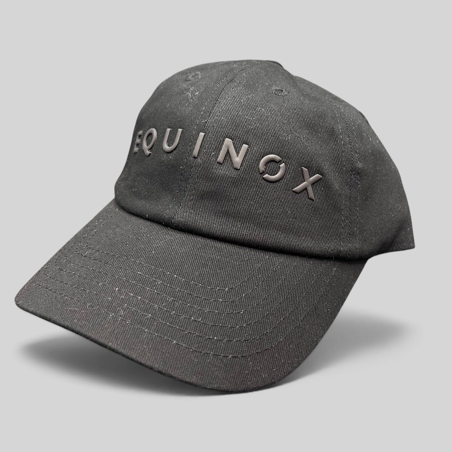 Raree Finds black Equinox x DI Snapback fitness hat with raised rubberized logo and adjustable strapback closure