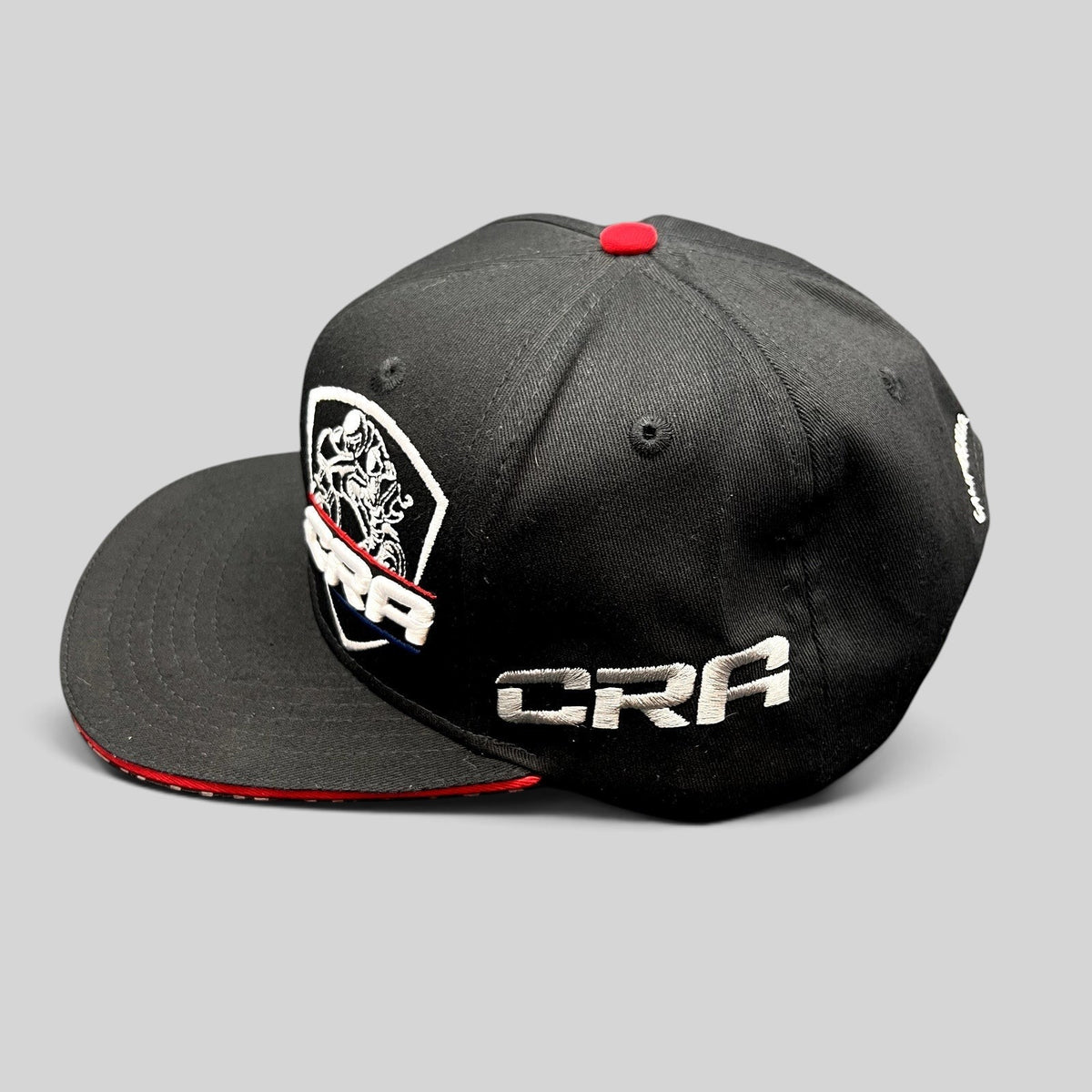 Raree Finds black snapback hat with embroidered ERA racing logo and CRA branding on the side
