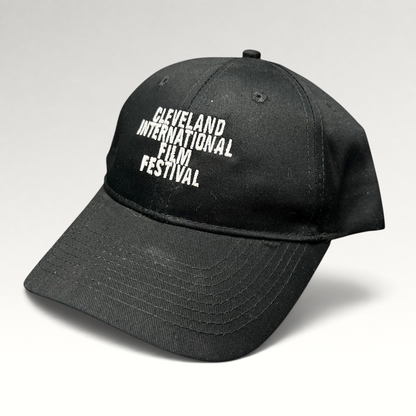 Raree Finds black strapback hat with white embroidered Cleveland International Film Festival lettering on the crown