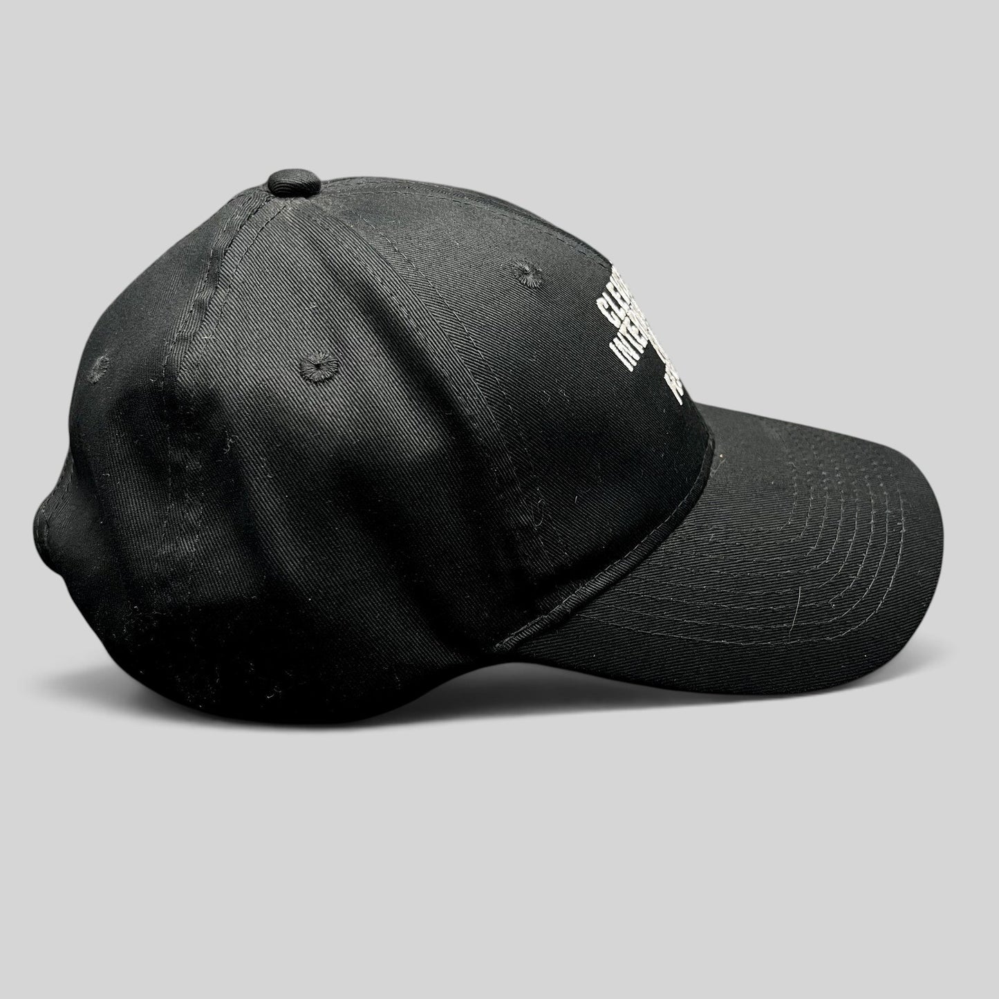 Raree Finds black strapback hat with white embroidered Cleveland International Film Festival lettering on the crown.