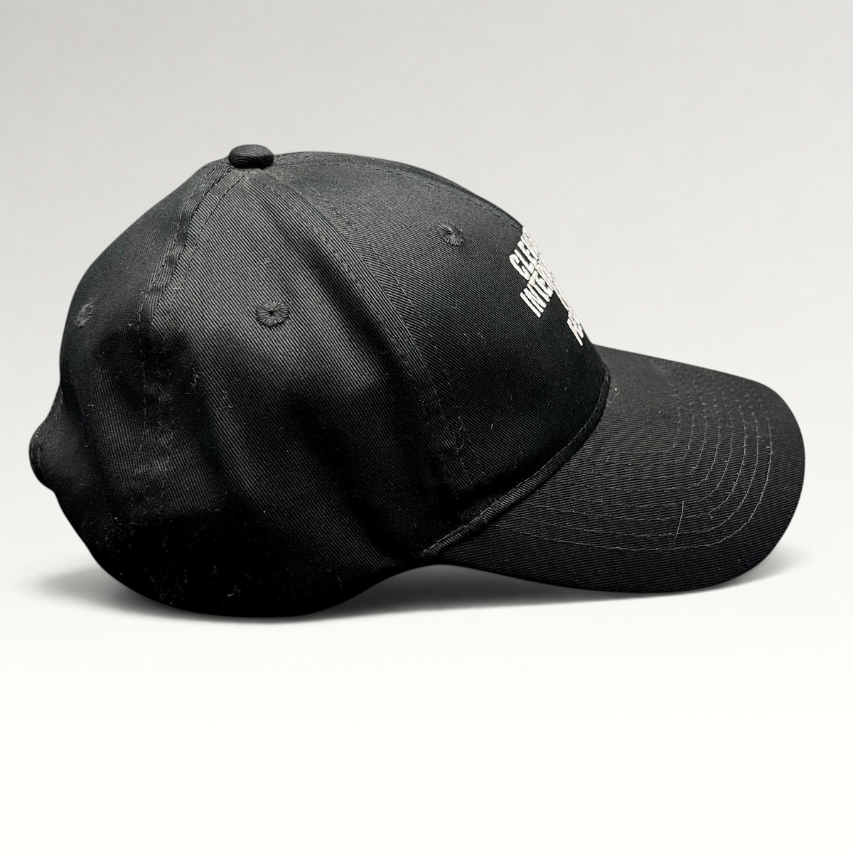 Raree Finds black strapback hat with white embroidered Cleveland International Film Festival lettering on the crown.