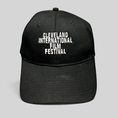 Raree Finds black strapback hat with white embroidered Cleveland International Film Festival lettering on the front