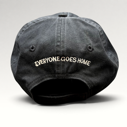 Raree Finds black cotton strapback hat with Everyone Goes Home embroidered on the back in white thread