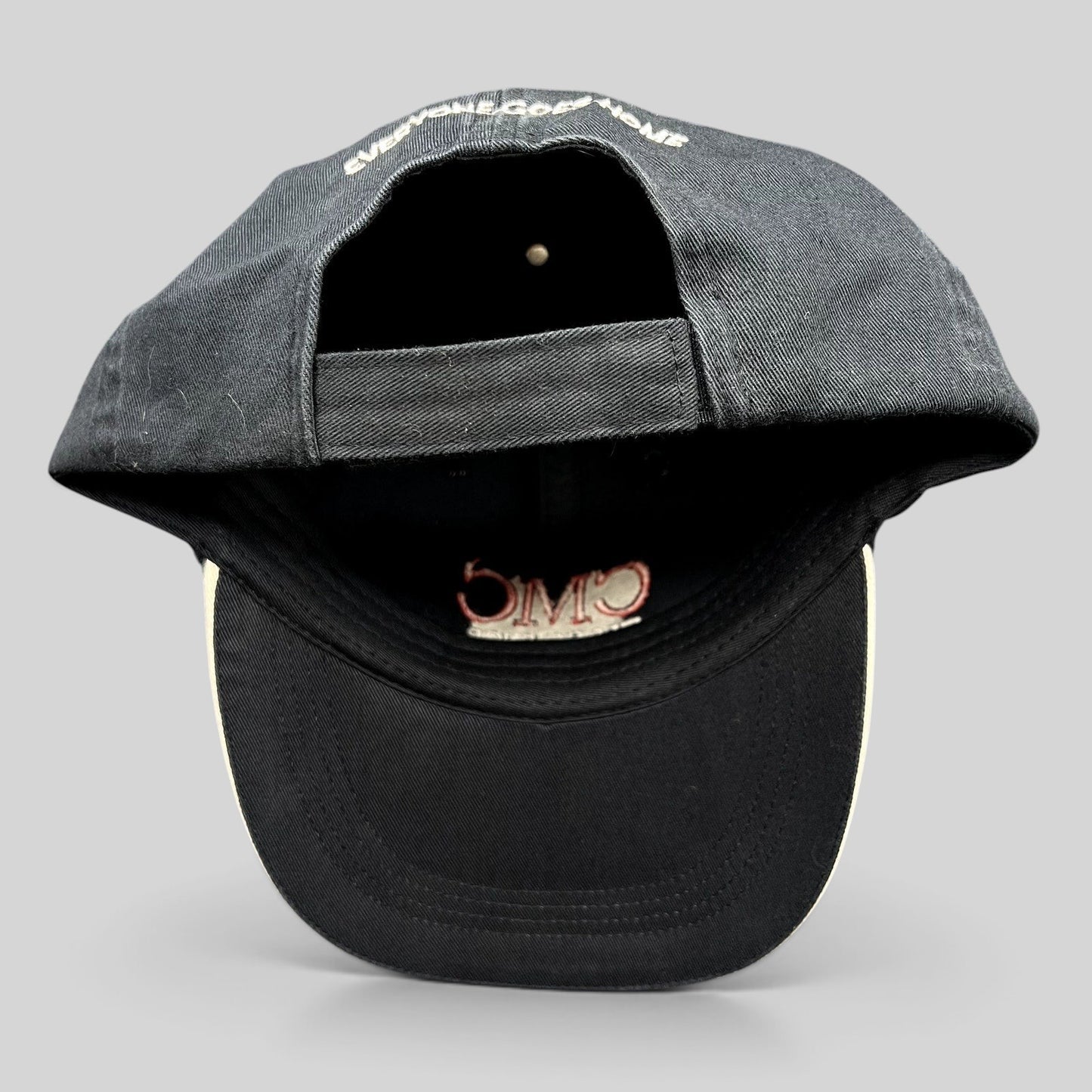 Raree Finds black cotton strapback hat with Everyone Goes Home embroidery on the back and CMC logo on the interior