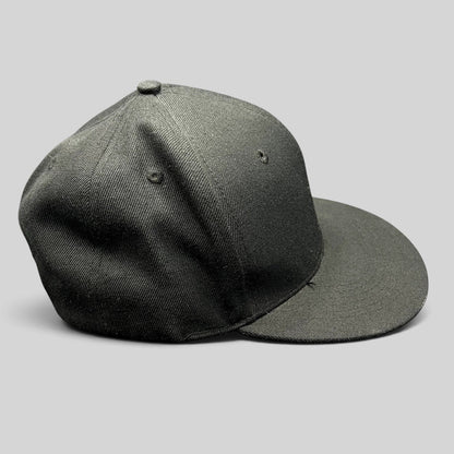 Raree Finds black Fits snapback hat with flat brim and structured crown, side profile view.