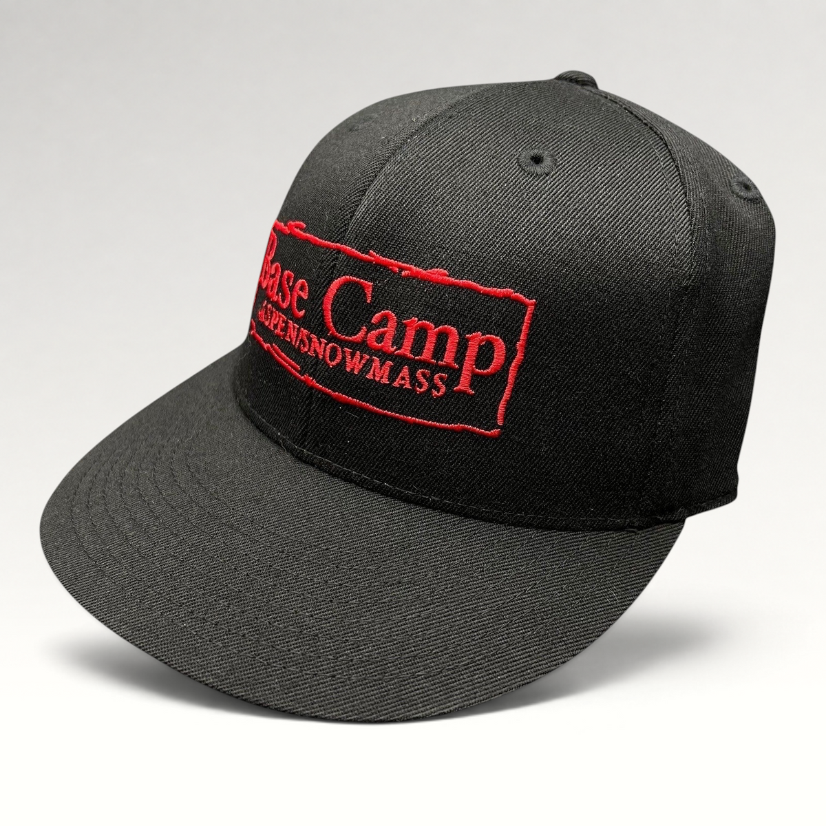 Raree Finds black Flexfit 210 fitted cap with red Base Camp Aspen Snowmass embroidered logo on the front