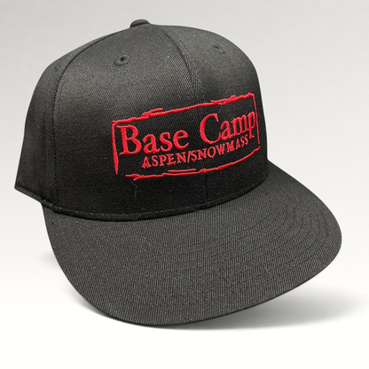 Raree Finds black Flexfit 210 fitted cap with red embroidered Base Camp Aspen Snowmass logo on the front crown.