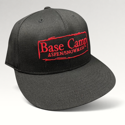 Raree Finds black Flexfit 210 fitted cap with red embroidered Base Camp Aspen Snowmass logo on the front crown.
