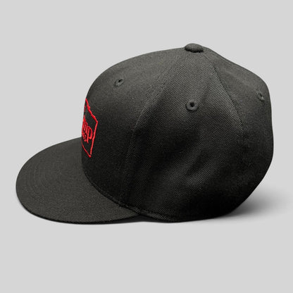 Raree Finds black Flexfit 210 fitted hat with red Base Camp Aspen Snowmass embroidered logo on the front