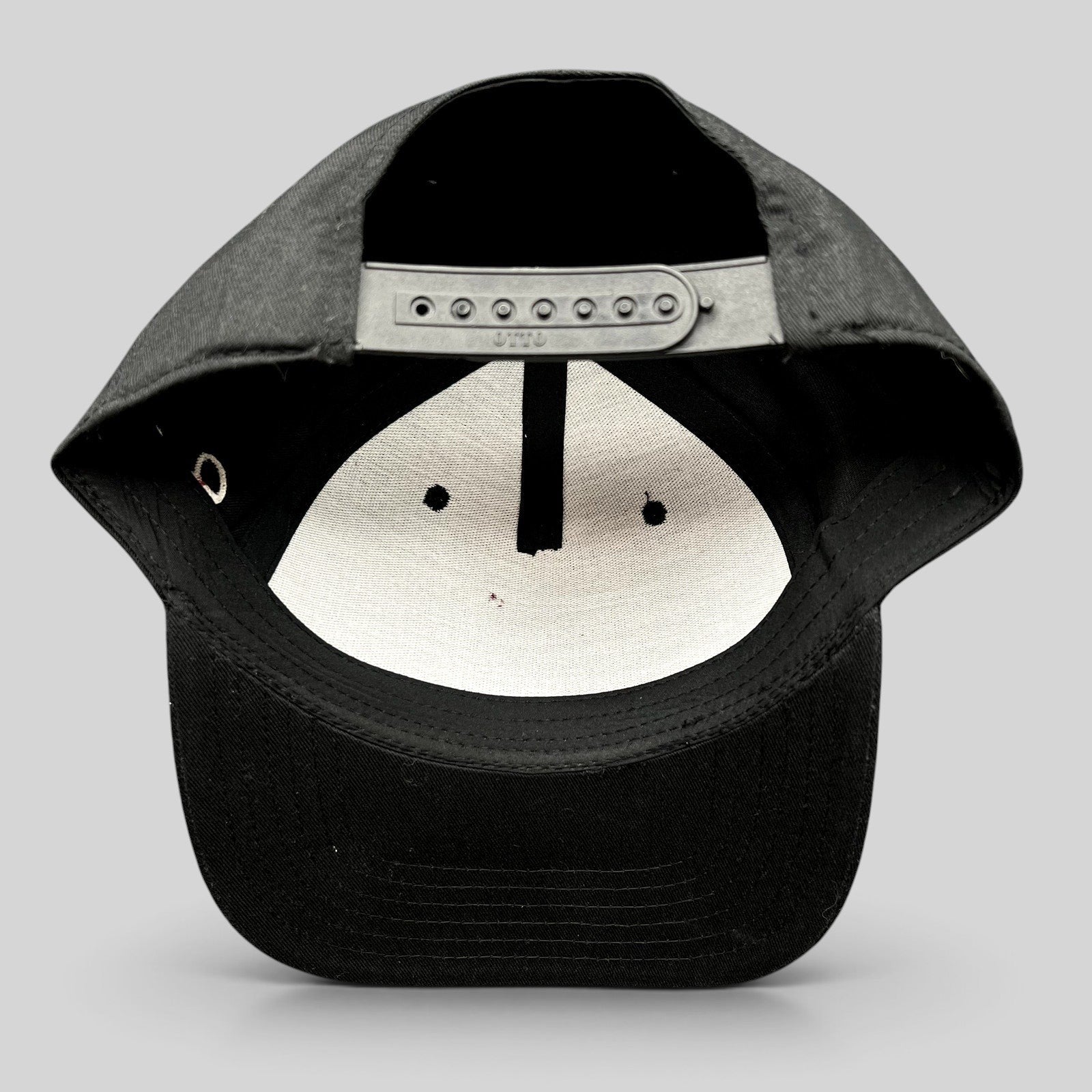 Raree Finds black Grammy U snapback hat showing the interior adjustable plastic snap closure and structured crown