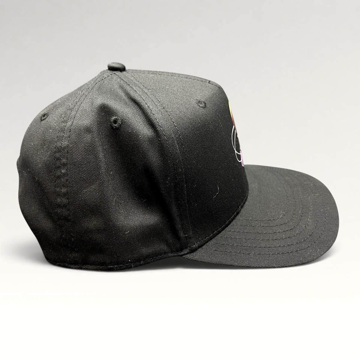 Raree Finds black Grammy U snapback hat with a structured crown and flat bill, side view.