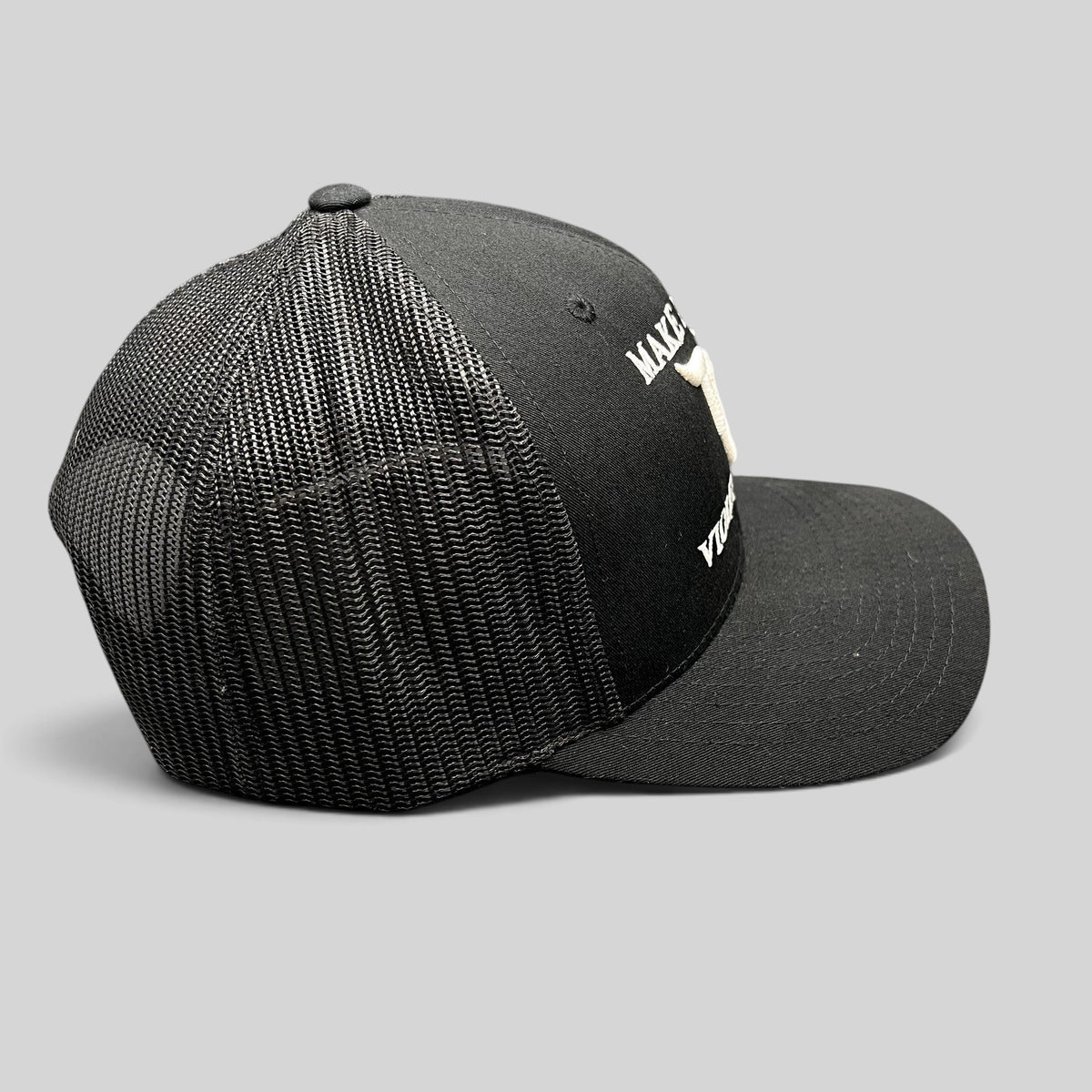 Raree Finds black Yupoong Classics trucker hat with white embroidered Make Hockey Violent Again slogan and horned logo