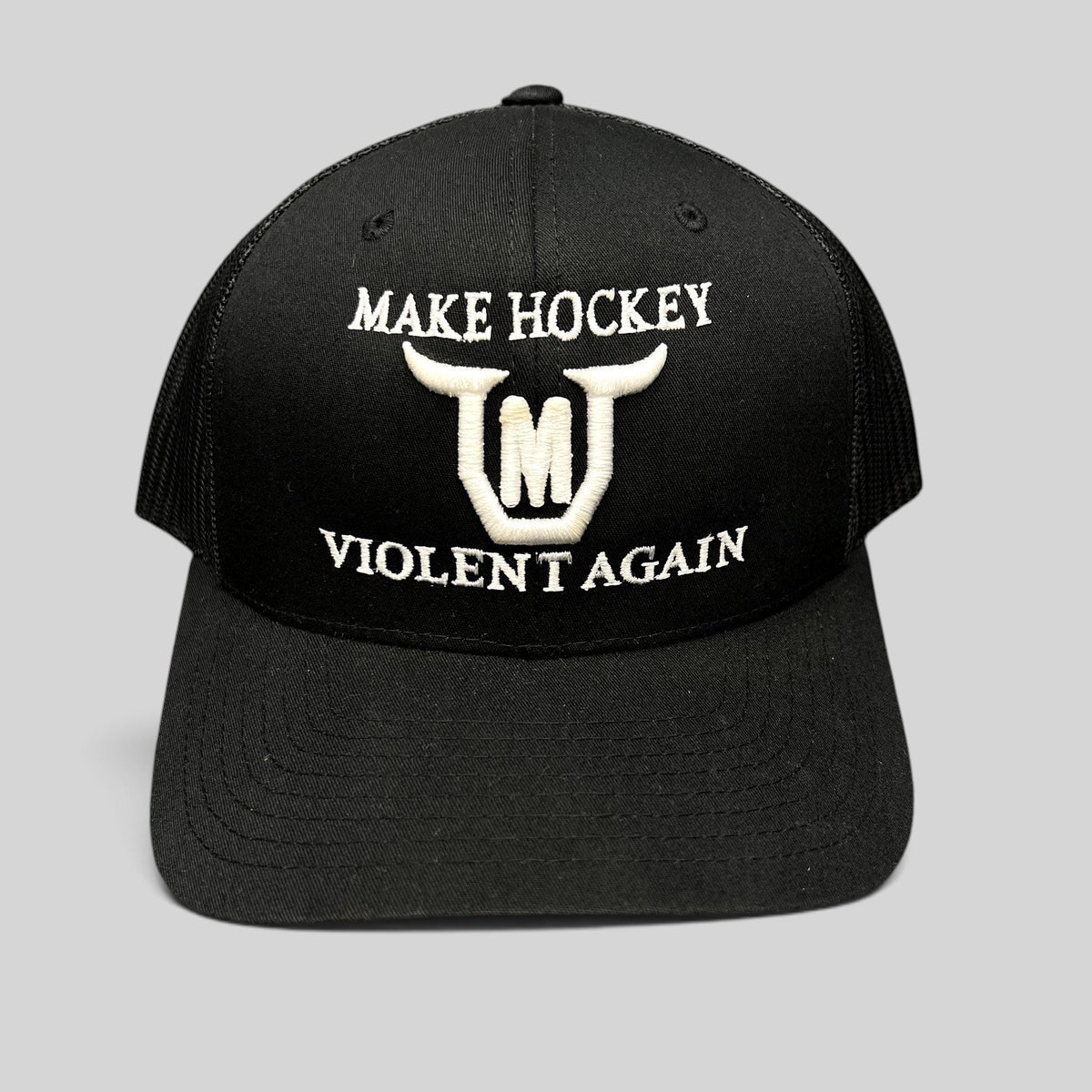 Raree Finds black Yupoong Classics trucker hat with white embroidered Make Hockey Violent Again slogan and horned logo