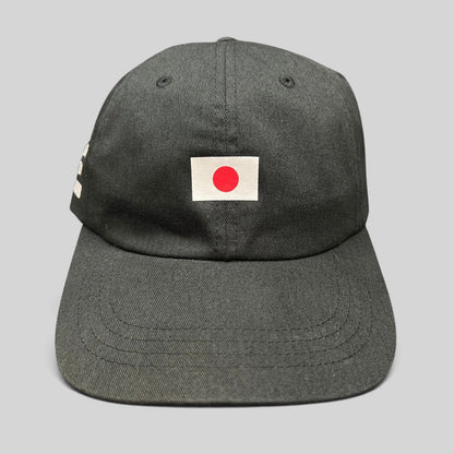 Raree Finds black cotton strapback hat featuring a centered Japanese flag graphic on the front