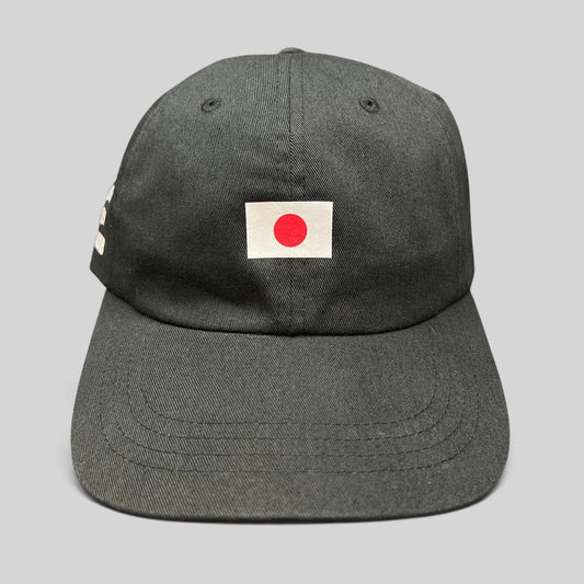 Raree Finds black cotton strapback hat featuring a centered Japanese flag graphic on the front
