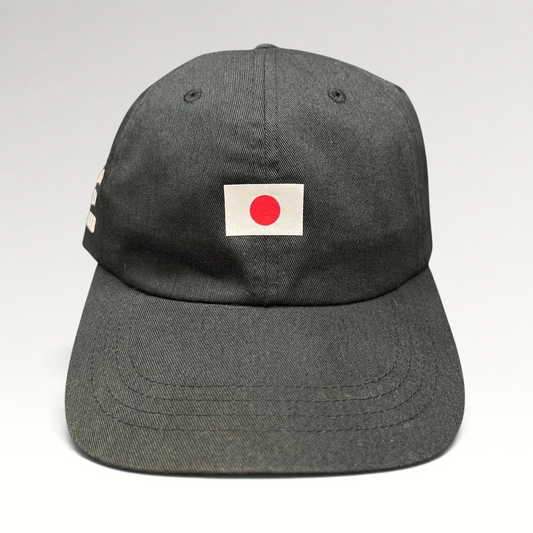 Raree Finds black cotton strapback hat featuring a centered Japanese flag graphic on the front