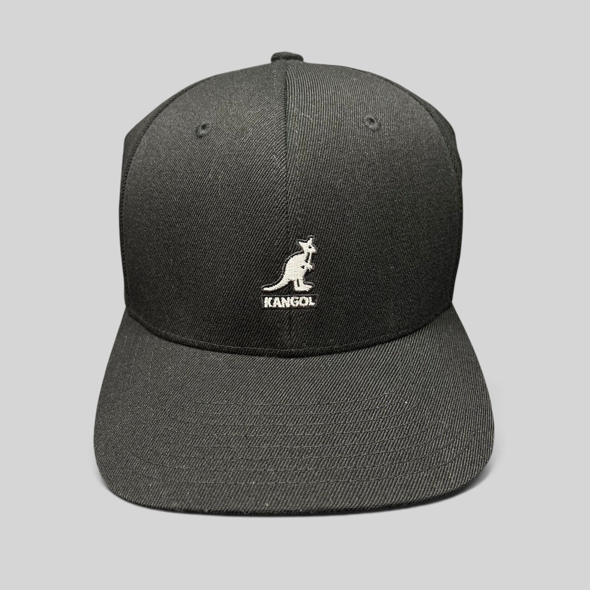 Raree Finds black Kangol flexfit baseball cap with white embroidered kangaroo logo and structured crown