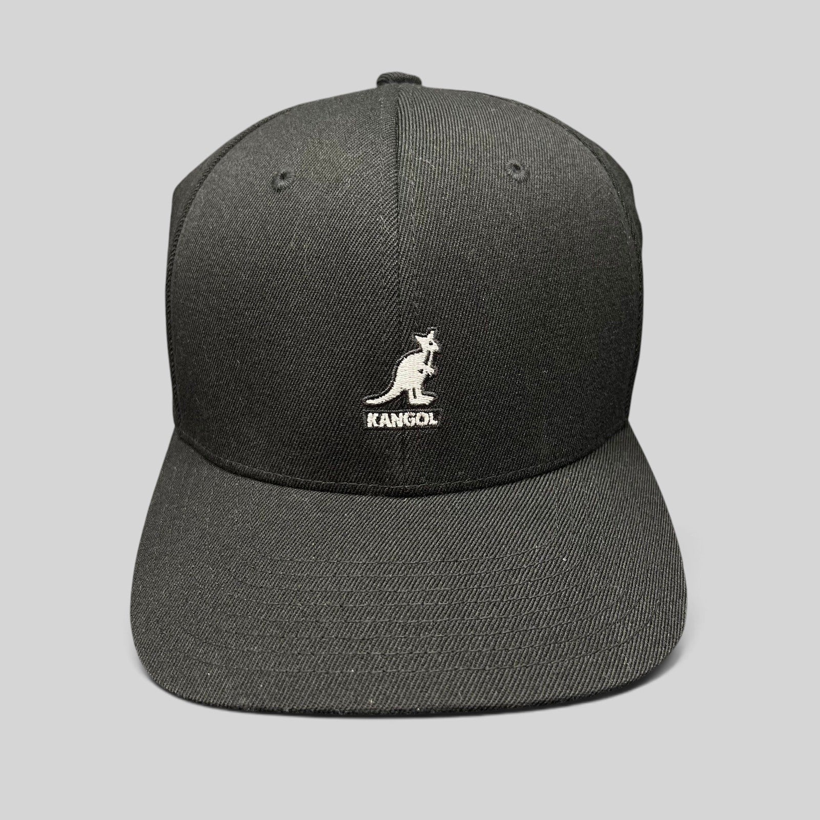 Raree Finds black Kangol flexfit baseball cap with white embroidered kangaroo logo and structured crown