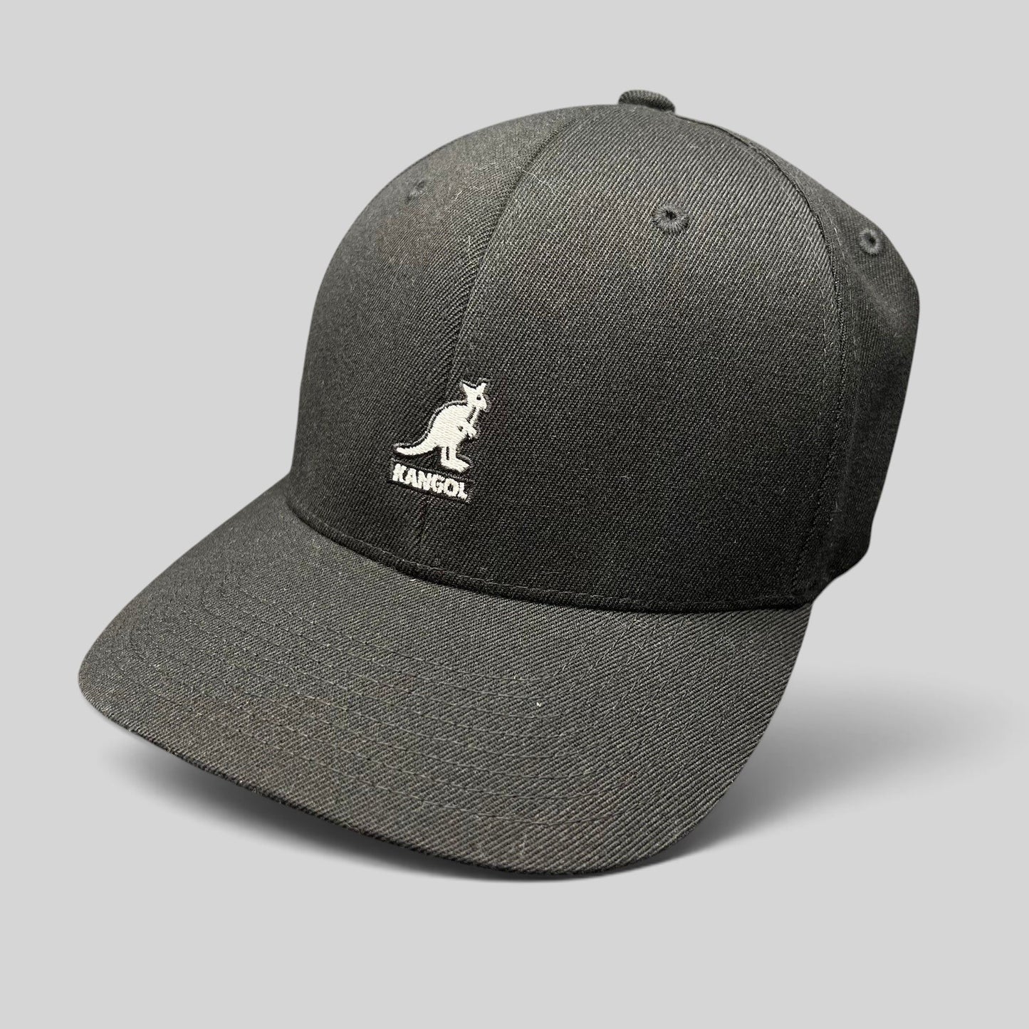 Raree Finds black Kangol flexfit baseball cap with white embroidered kangaroo logo on a structured crown