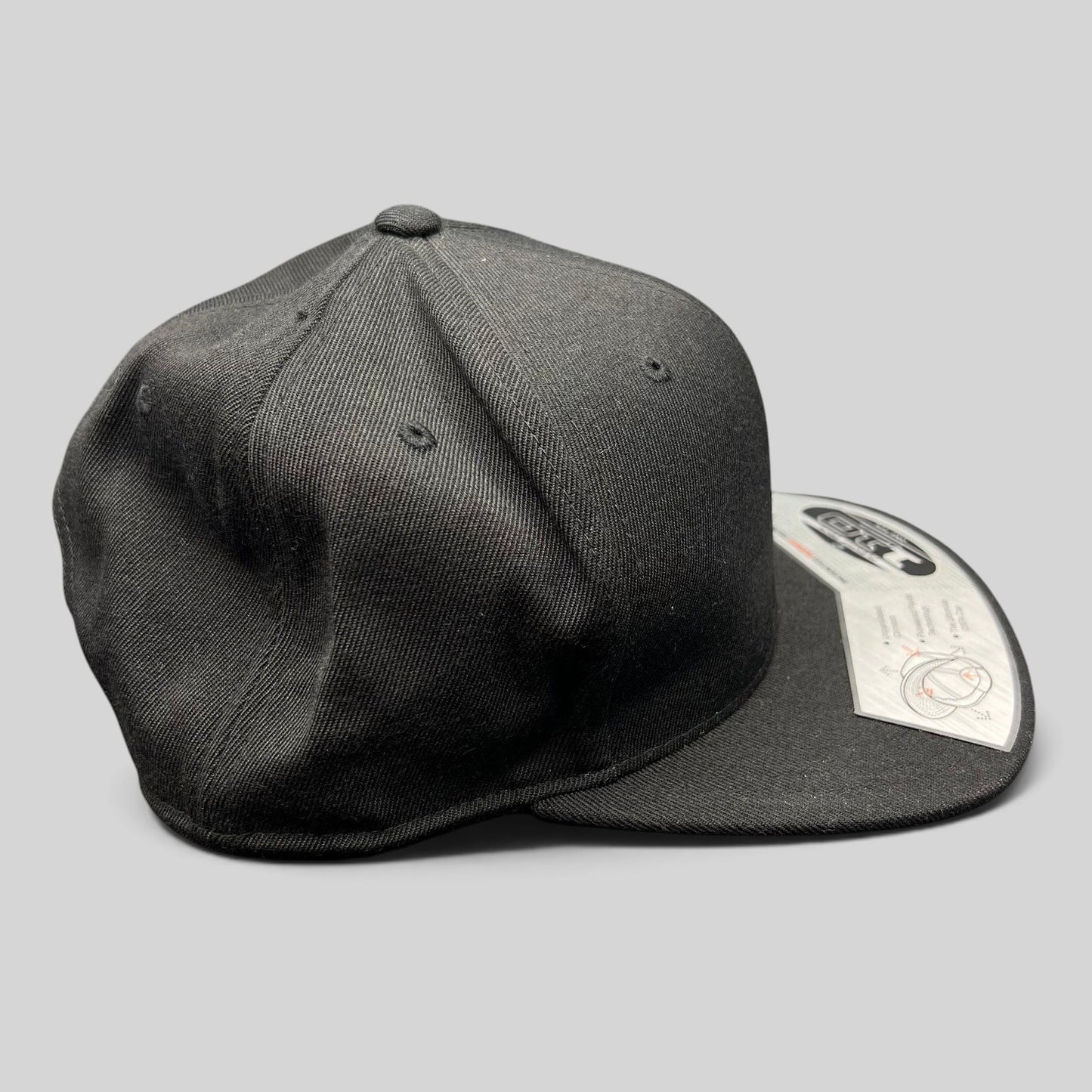 Raree Finds black Kenichi Fishing Flexfit 110 snapback hat with a structured crown and flat brim.