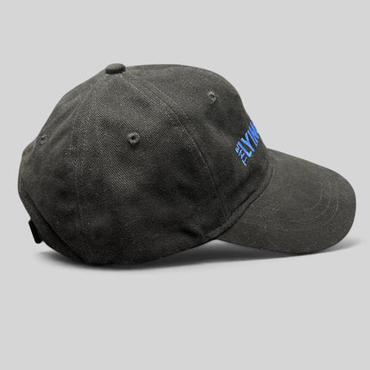 Raree Finds black cotton strapback hat with blue The Lying Game embroidery, side profile view of pilot crew cap.