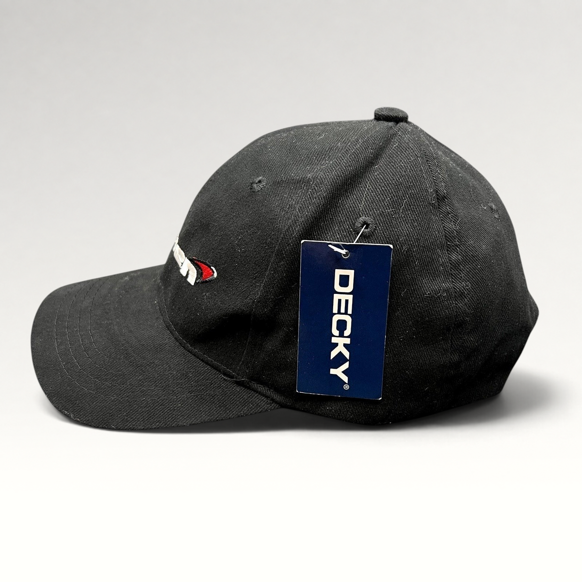 Raree Finds black McLaren cotton strapback hat with Decky brand tag, featuring embroidered logo and six-panel design.