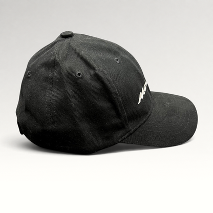 Raree Finds black McLaren cotton strapback hat with white embroidered logo, side profile view of 6-panel cap.
