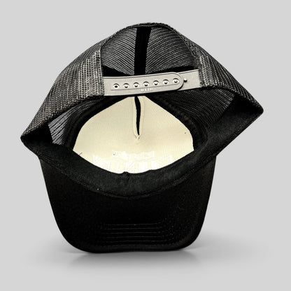 Raree Finds black trucker hat with mesh back, adjustable snapback closure, and white interior embroidery