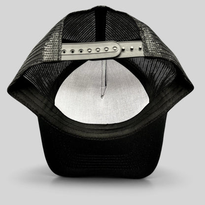 Raree Finds black mesh trucker hat showing the adjustable snapback closure and interior crown view