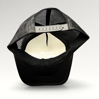 Raree Finds black trucker hat with mesh back, adjustable snapback closure, and white interior embroidery