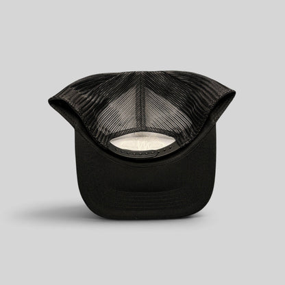 Raree Finds black mesh trucker hat with adjustable snapback closure seen from the back interior view